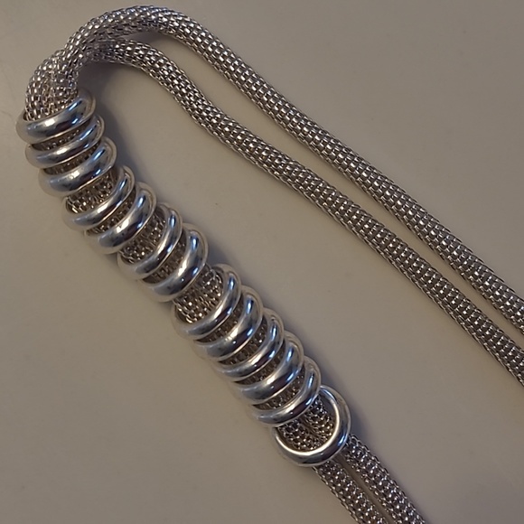 Serpentine bi-strand silver-tone necklace w/ silver-tone ring pendants - Picture 9 of 10